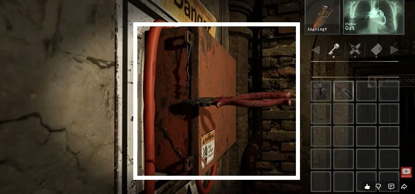 Hier wird der Draht am Stromkasten mit der Zange durchgeschnitten